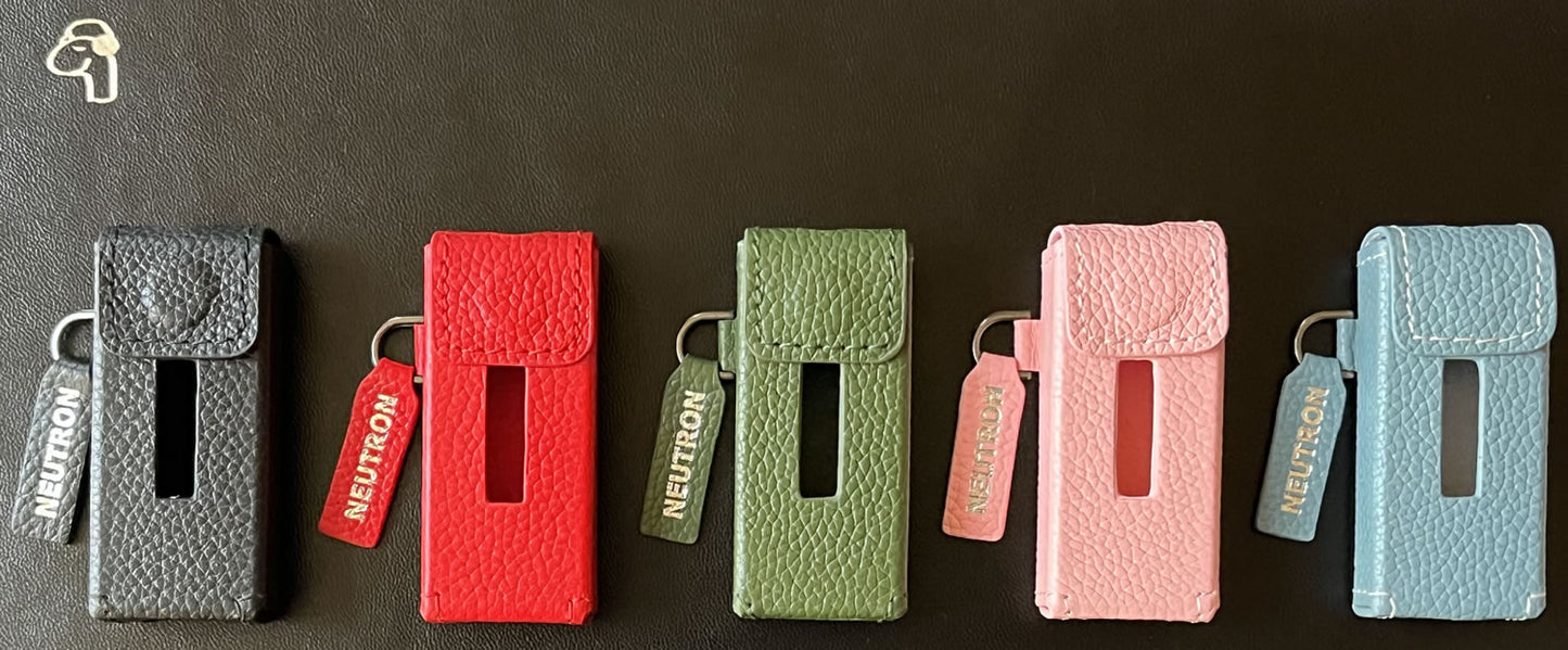 Neutron HiFi DAC leather case available in multiple colors: green, red, pink, and blue.